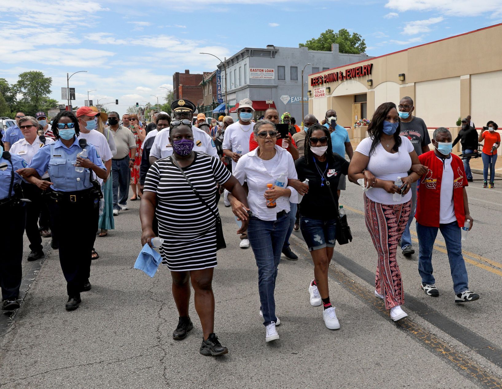 Loved ones remember David Dorn outside Lee's Pawn